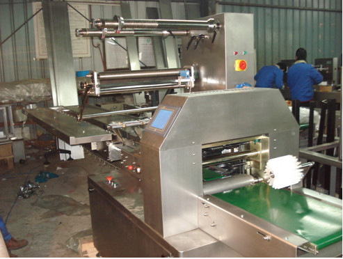 Wholesale High Efficiency Flow Wrap Packaging Machine With Human Machine Interface from china suppliers