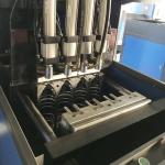 4 Cavity Semi Auto Blowing Cover Bottle Machine for Small Bottles and Customized