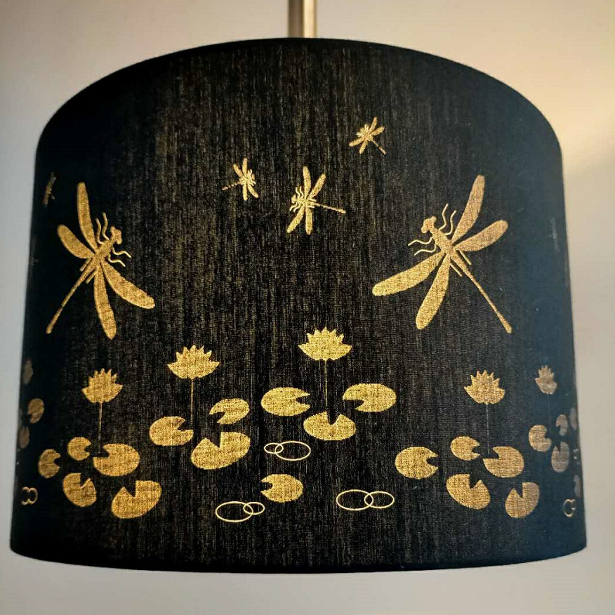 Blue drum shade with lotus flower laser cut