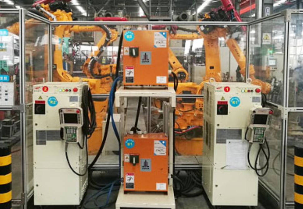 Automatic welding workstation for rear floor assembly