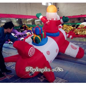 Customized Inflatable Santa Claus with Airplane for Christmas Supplies