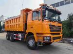 Neon Red Heavy Dump Truck 20 Cubic Yards Capacity MAN Axle Collision Mitigation