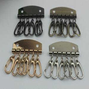 China Leather Key Case Wallets Unisex Keychain zinc alloy Key Holder Ring with 6 Hooks Snap Closure on sale