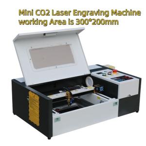 Wholesale 40W 50W 300*200 3020 Small Portable Laser Engraver CO2 Laser Printer from china suppliers
