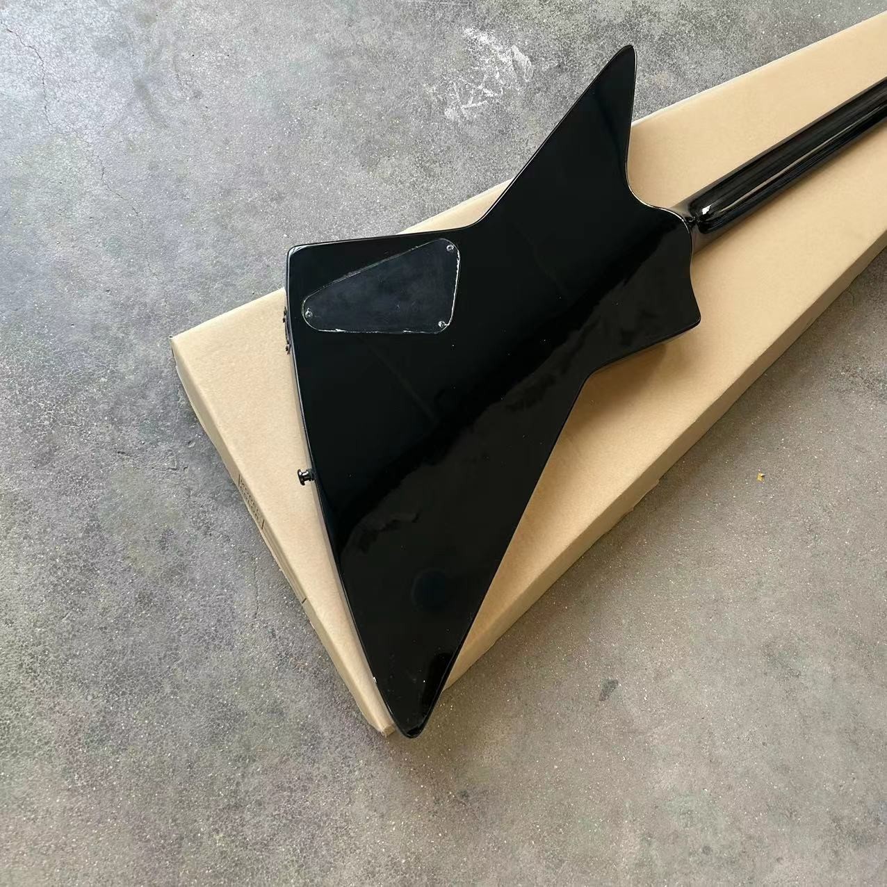 Custom special shape body ESP style electric guitar in black color glossing finish