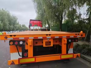 Wholesale Double Axles Iron Texture Length From 10m To 20m Heavy Duty Low Flatbed Transport Truck Semi Trailer from china suppliers