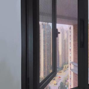 China Aluminum Frame Sliding Anti Mosquito Fly Bug Door Screen Net Mesh Fiberglass Roller Retractable Screen Door on sale