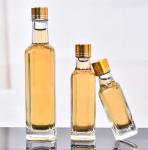 Glass Olive Oil Bottle 100ml 250ml 500ml Round Clear Cooking Oil Bottle with Cap