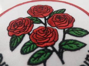 China custom design logo red rose round embroidery patch for clothing on sale