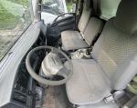 Used truck Isuzu ELF 600p Cargo Truck 4KH1 Diesel Engine And White Body