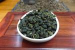 China Newest Tieguanyin Oolong Tea Fujian Anxi Organic Tieguanyin Tea Vacuum
