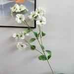 Artificial flowers for a wedding coffee shop setting with simulated crabapple
