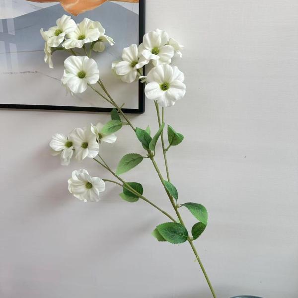 Artificial flowers for a wedding coffee shop setting with simulated crabapple