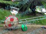 Hand maize and beans seed planter