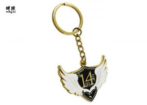 Wholesale Wing Shaped Metal Key Ring Gold Finishing With White And Black Enamel from china suppliers