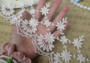 China Embroidered Alibaba China Wholesale Embroidered Chemical White flower Lace Fabric trimming for dress sale on sale