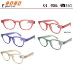 Women's colorful plastic reading glasses with spring hinge and two pins on the