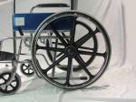 Solid Castor Folding Steel Wheelchair Fixed Armrest And Footrest