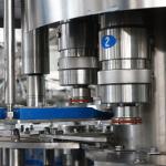 3 In 1 XGF TriBlock Water Bottle Filling Machine 30000BPH High Speed Bottling