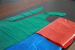 White Disposable PE Apron Flat Packing , Sleeveless Plastic Aprons For Adults