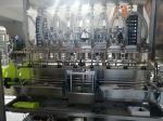 Stainless Steel Bottle Packing Machine 4 Nozzle 30BPM Automatic Filling And