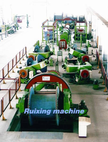 Drum twister laying-up machine for pre-spire or non-spire cores for stranded