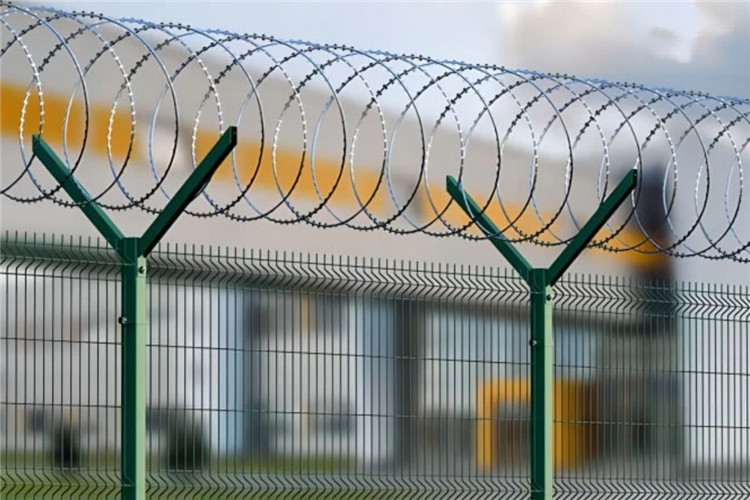 High Security Concertina Razor Wire On The Top Of Airport Perimeter Security Fencing