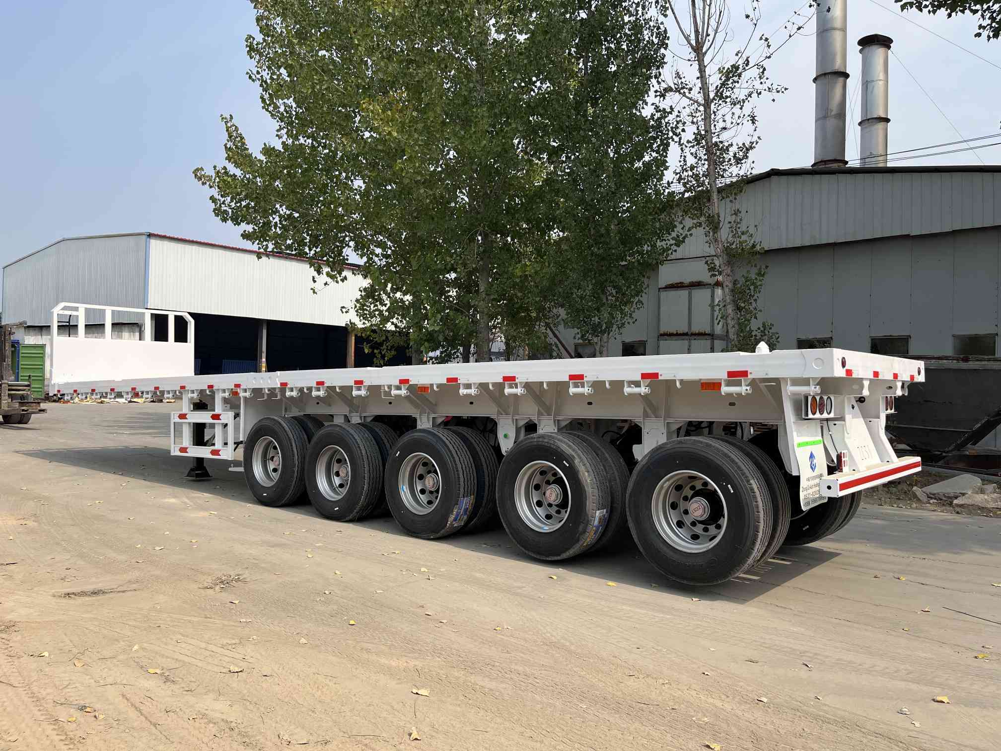 CIMC new 4 Axle 80-100 Tons use for transport heavy equipment machinery and oversized loads Flatbed Container Semi Truck Trailer
