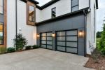 Black Automatic Garage Door Electric Sectional 0.76PVB Fluorocarbon Paint