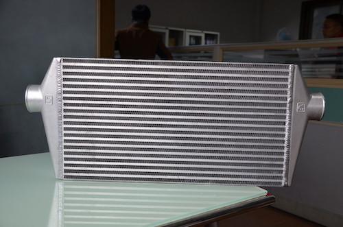 Automotive aftermarket charge air cooler aluminum bar & plate air to air heat