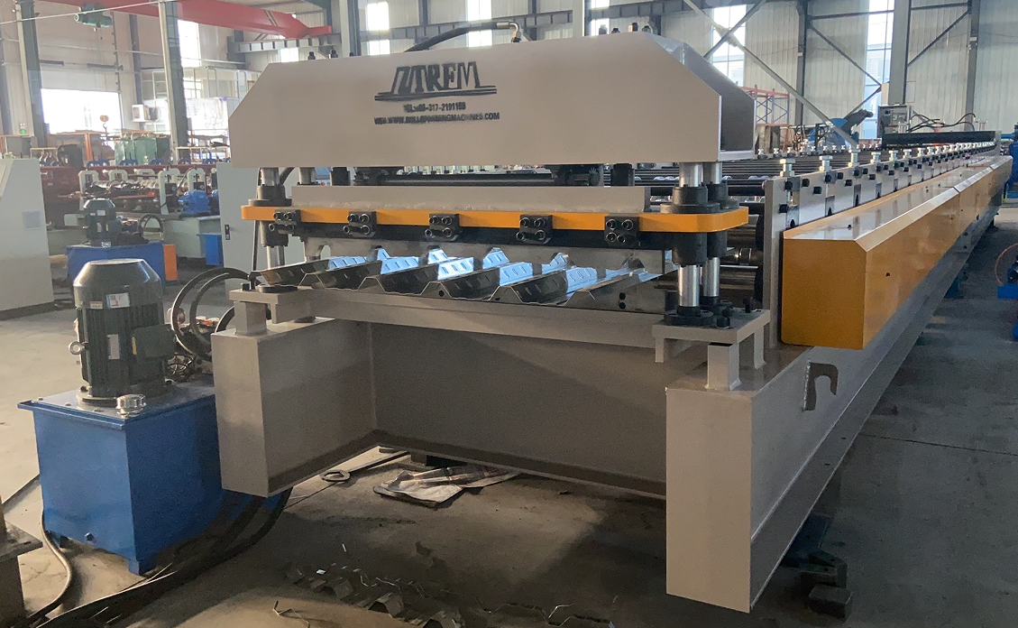 Metal decking machine