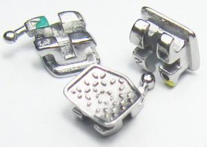 Wholesale MIM One Pieces Metal Brackets Dental Orthodontic Instruments With Serated Base from china suppliers