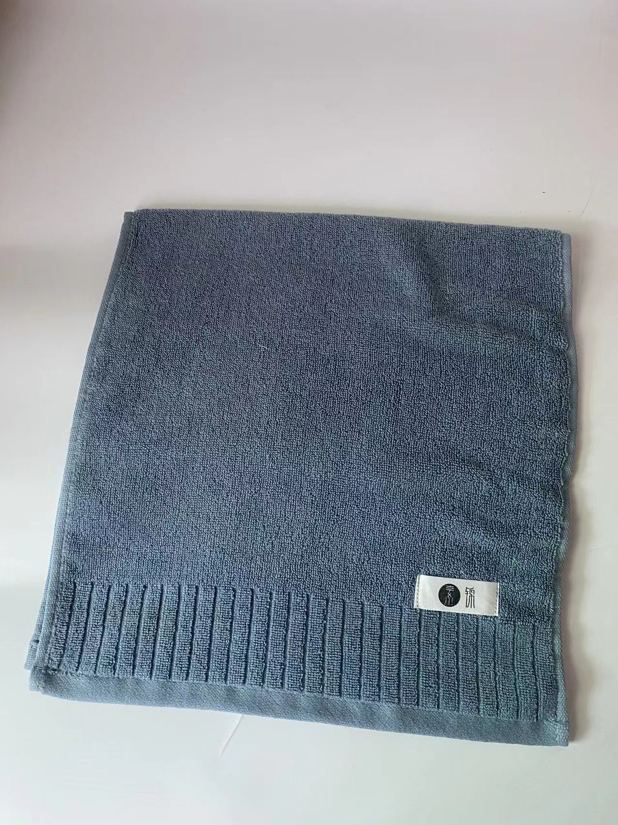 Soft and plush cotton bath towel with double-sided extreme strand plain striped design