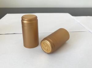 Wholesale Beautiful PVC Heat Shrink Capsule for Vodka Caps custom design black golden PVC heat shrinkable film wine capsule from china suppliers